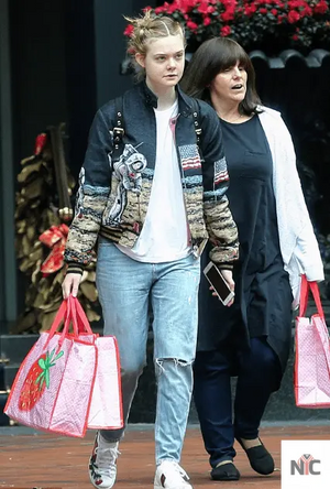 Elle Fanning Saint Laurent Moon Landing Black Varsity Jacket The Urban Hawk