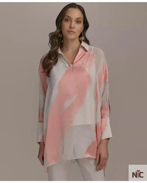 Beyond The Gates 2025 Tamara Tunie Coral Brushstroke Blouse The Urban Hawk