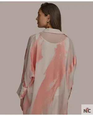 Beyond The Gates 2025 Tamara Tunie Coral Brushstroke Blouse The Urban Hawk