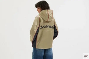 Veste coupe-vent rétro dorée d’Arsenal The Urban Hawk