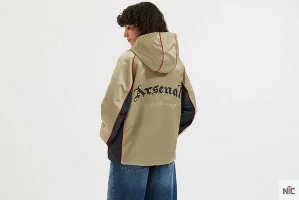 Veste coupe-vent rétro dorée d’Arsenal The Urban Hawk